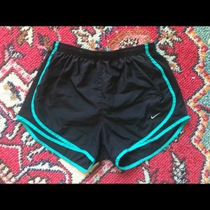 Black Nike running athletic shorts blue trim